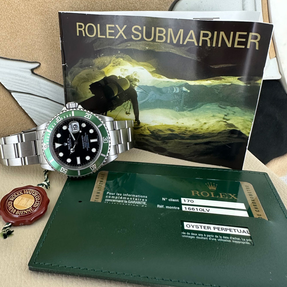 Submariner ghiera verde hot sale quadrante nero